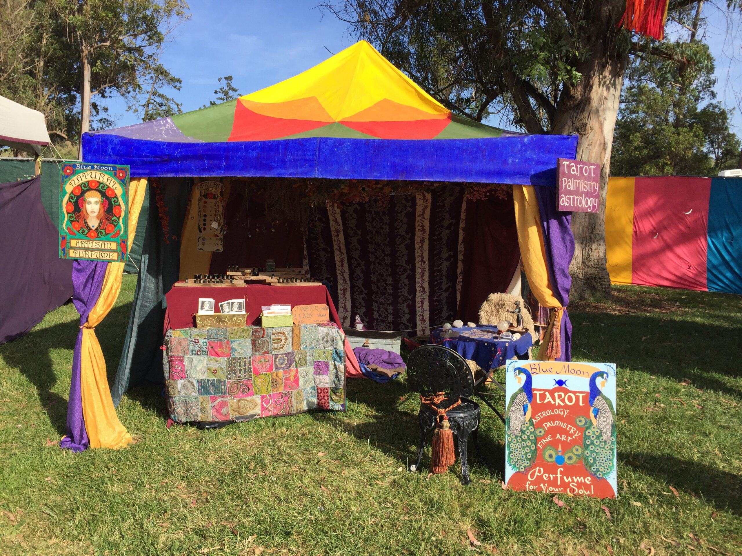 Blue moon pop-up in a grassy park.